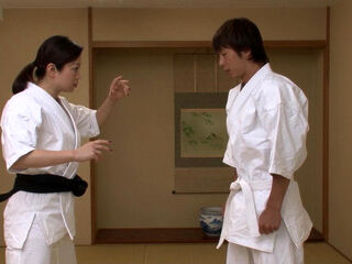 Asia Woman Gets Horny with Kong Fu and Trainer Helps Her