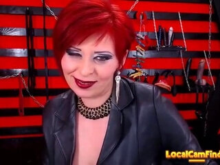 Seductive Red Head Dom Milf Smoking On Cam In Boots