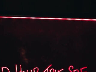 Four horny girls in seductive lingerie and stockings team up on one guy and take turns getting their pussies pounded