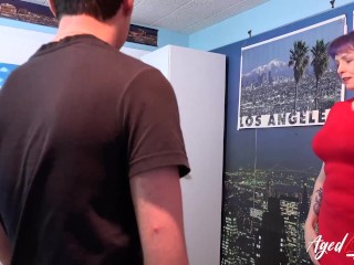 'Guy kneads her massive breasts, before having sex with her in bed.'