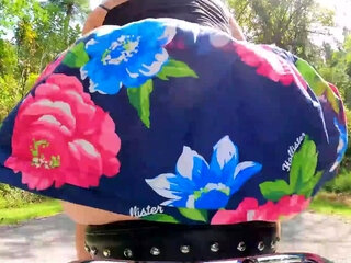 Butt plugged wife rides bike in the park and shows her toy