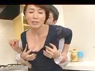 Japanese milf seduces a young man and blows his h