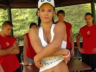 A woman gangbangs the whole basketball squad