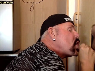 Gloryhole cum loving DILF sucks rod in homemade video