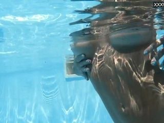 'Watch her swim naked underwater in the pool'