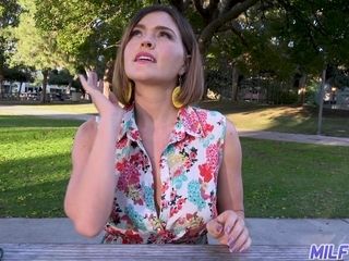 Smiling bright sexy busty MILF is actually ready to be picked up outdoors